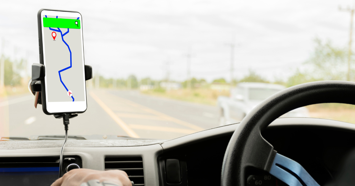 Smart phone mounted on a dash with a generic map app open