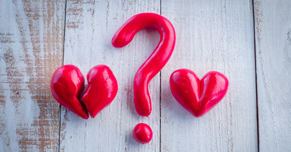 Asking the right question. Red Question mark between two hearts